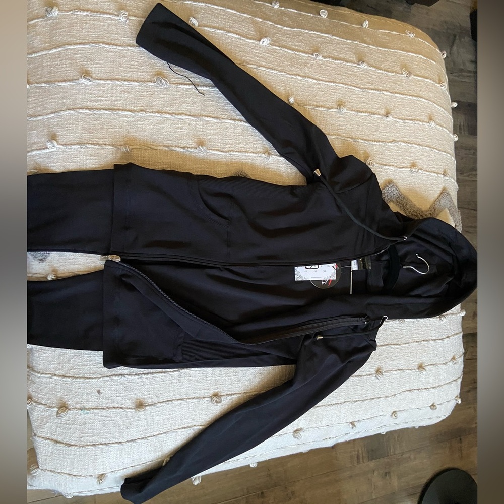 Brand New Polyester/Spandex Women’s Two Piece Hoodie With Leggings. 
Size: S/M